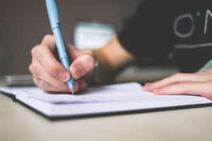 Man writing notes